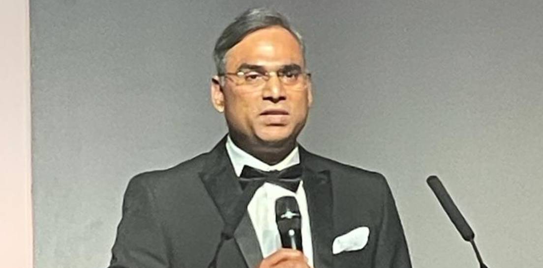 Manoj Gupta delivering the keynote speech at European Software Testing Awards 2022 in London, United Kingdom